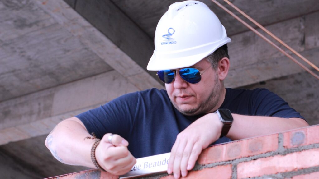 Late Lee bricklaying for The Plenum wall.