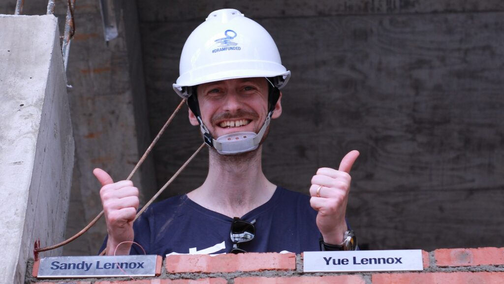 Sandy bricklaying for The Plenum wall.